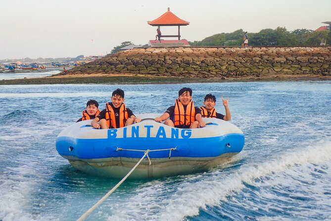 Bali Watersport Package: Parasailing Adventure, Jet Ski, Banana and Donut Boat - Flying above Tanjung Benoa on the parasail