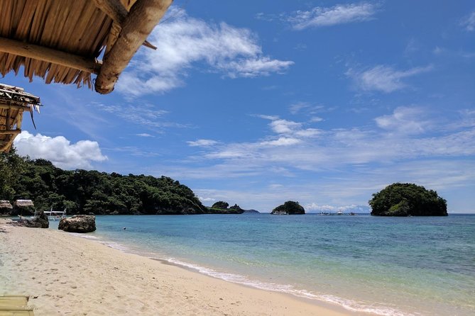 Boracay Island Hopping + Hot Kawa + Parasailing + Helmet Diving - Optional Crystal Cove and Magic Island stops