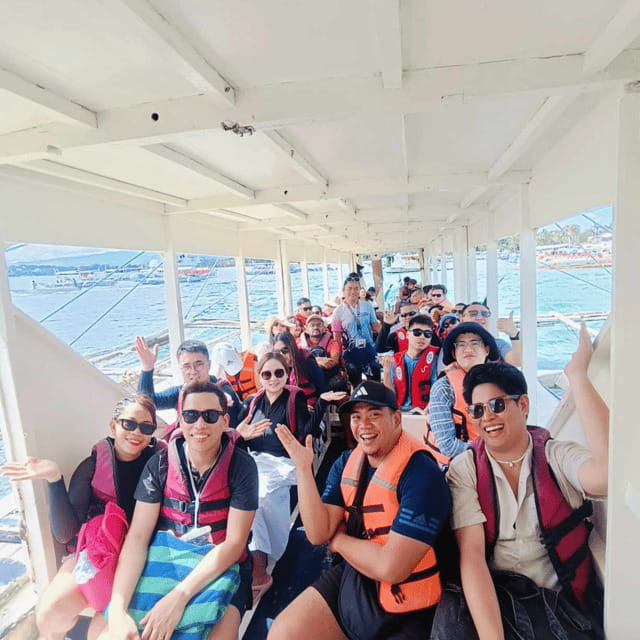 Boracay: Island Hopping with Lunch and Parasailing - Island hopping by shared boat