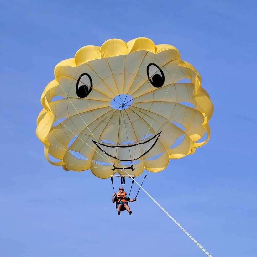 Boracay: Parasailing, Island Hopping, ATV Ride and Kawa Bath - Parasailing over Boracay’s coast