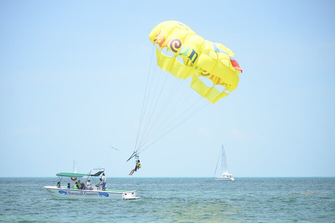 Cancun Seaside Parasailing and Jet Sky Combo - Switching from quiet skies to a jet ski