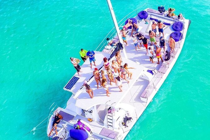 Catamaran Cruise with Snorkeling & Parasailing - A four-hour mix of sea, sky, and music