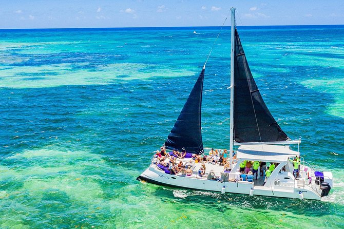 Catamaran Cruise with Snorkeling & Parasailing - Parasailing above the Punta Cana coast