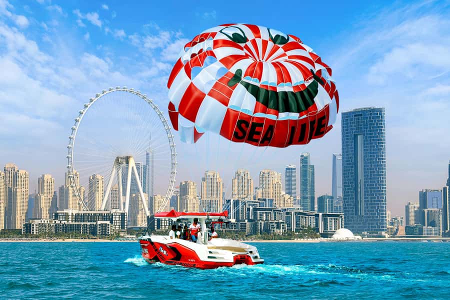 Dubai: Palm View and JBR View Parasailing Experience - Leaving Dubai Harbour for the open Gulf