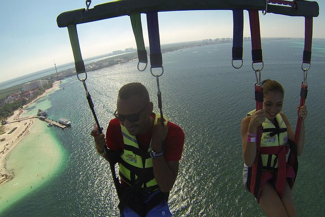 Fly Above Cancun Bay: Parasailing Experience - Getting airborne from the boat