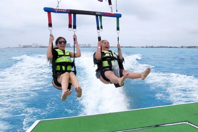 Fly Above Cancun Bay: Parasailing Experience - Cancellation and practical planning