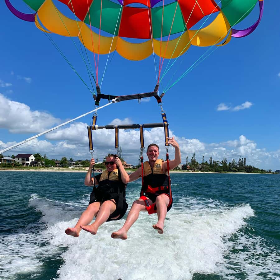 Gold Coast: Surfers Parasailing with Free Photos - The safety briefing and harness setup