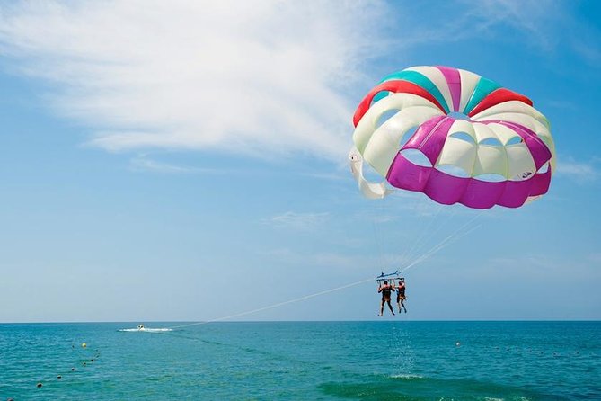 Ile aux Cerf: Speed boat with Parasailing & Tube Riding and Lunch - Grand River South East Waterfalls by boat