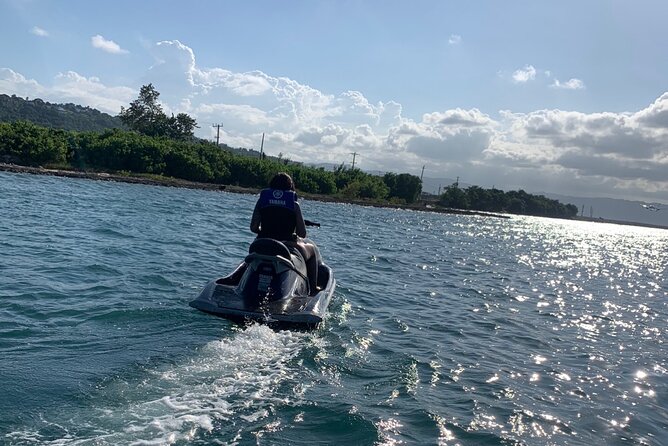 Montego Bay Jet Ski and Parasailing Combo or Single with Pickup - Parasailing above the Jamaican coast