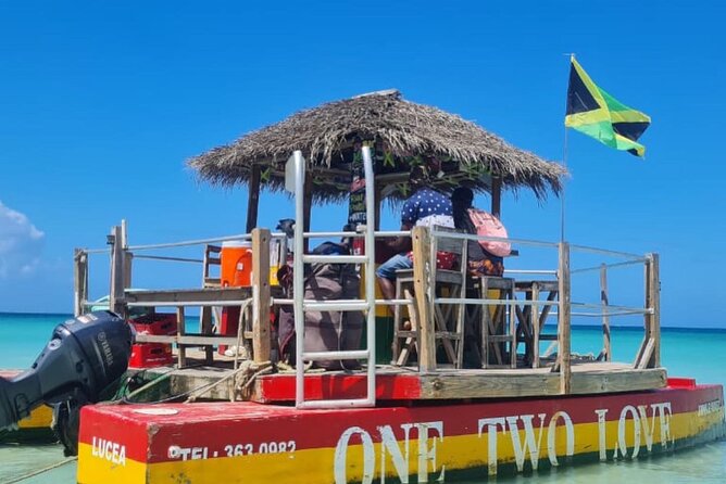 Negril Seven Mile beach, Catamaran Cruise ,Parasailing,with Sunset at Ricks Cafe - Rick’s Cafe and the sunset finish