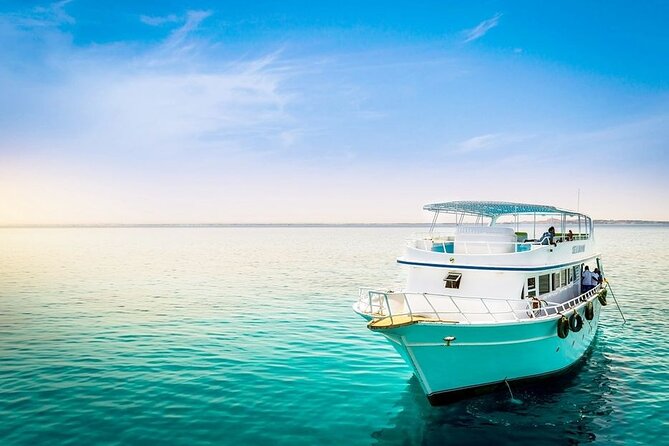 Orange Bay Island Boat Trip and Parasailing with Lunch - Hurghada - Snorkeling brings you to the Red Sea reefs