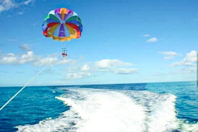 Parasailing above Turquoise Ocean Waters in Montego Bay - The personal service that helps the day run smoothly