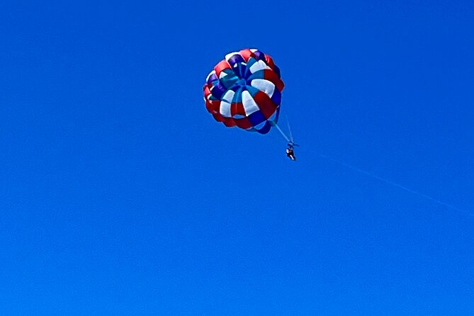 Parasailing above Turquoise Ocean Waters in Montego Bay - What to pack for the water and wind