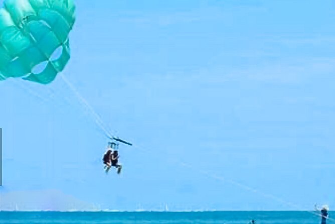 Parasailing above Turquoise Ocean Waters in Montego Bay - The ride to the water with private transport