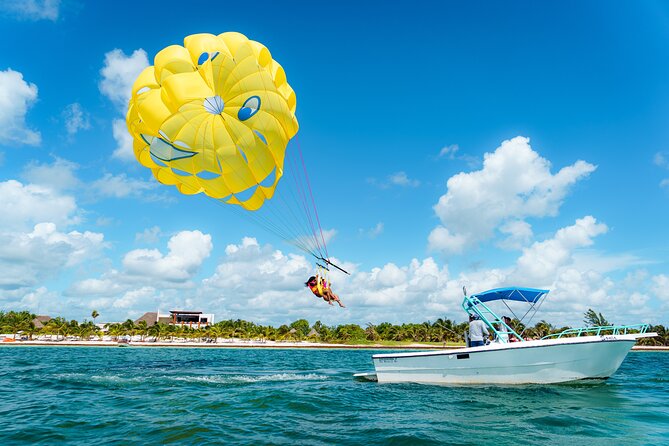 Parasailing & Beach Club with Transportation In Riviera Maya - Taking flight above Maroma Beach