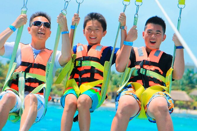 Parasailing & Beach Club with Transportation In Riviera Maya - Preparing for the beach and boat