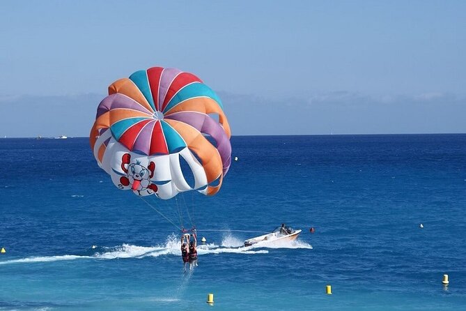 Parasailing Fly over Red Sea of Hurghada with Private Transfer - The boat ride leads to a short, high view
