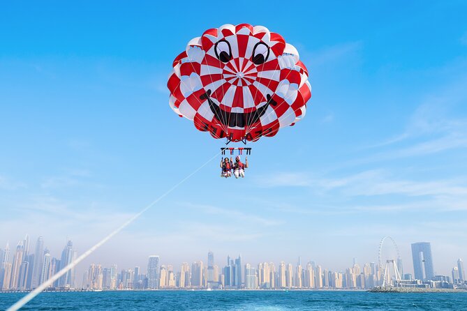 Parasailing in Dubai with Palm Jumeirah and JBR Beach views - From Dubai Harbour to the JBR launch area