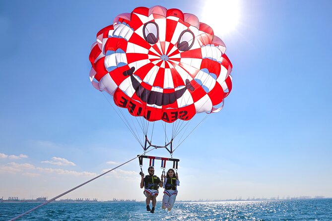 Parasailing in Dubai with Palm Jumeirah and JBR Beach views - How weather can change your plans