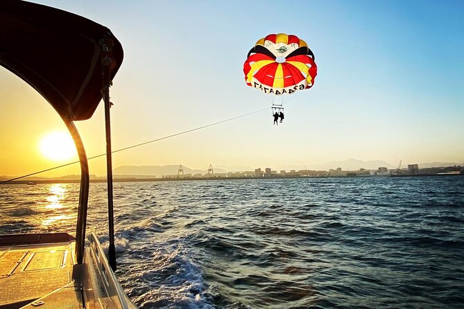 Parasailing in Torrevieja - A boat trip with music, drinks, and coastal views