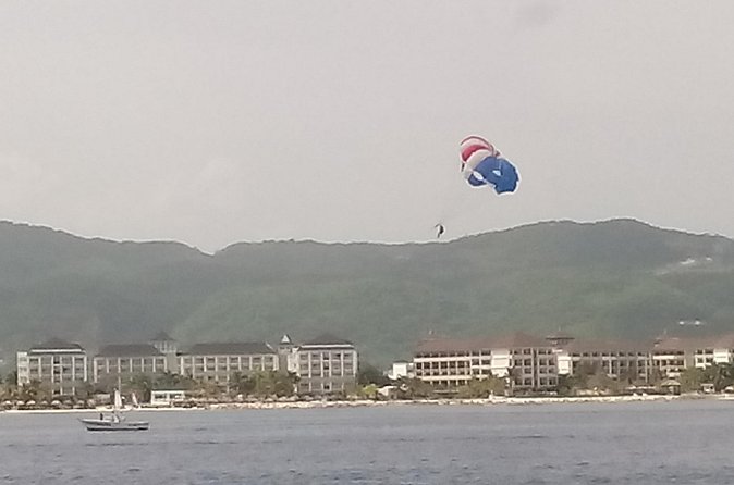 Parasailing Snorkeling and Glass Boat Adventure in Negril - The Staff and Group Feel