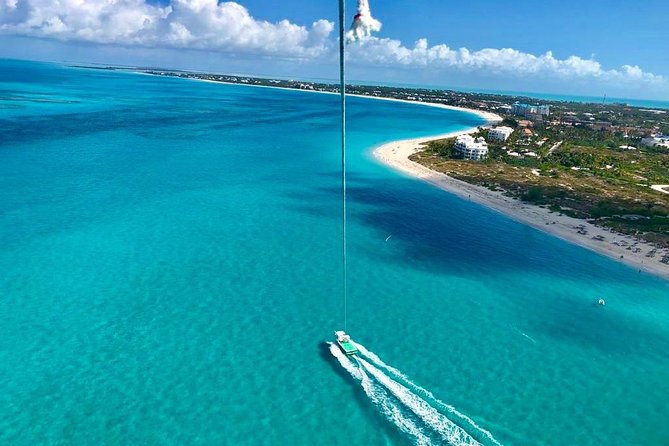 Private 4hr Parasail - Snorkel & Water-Sports Adventure, Turks and Caicos - Learning the parasail routine from the boat