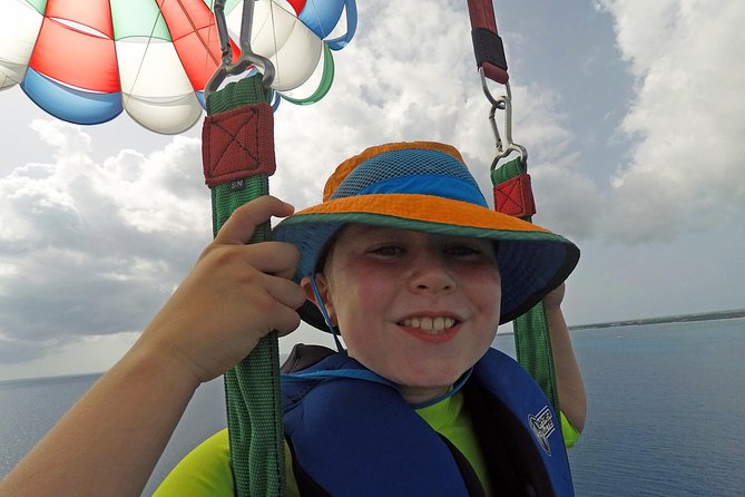 Punta Cana Parasailing & Snorkeling Cruise Experience - From speedboat to double-decker catamaran