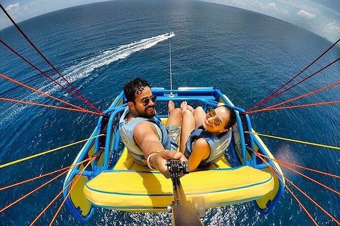 Sky Rider Oceanside Parasailing Experience in Cancun - High above Cancun’s white sand