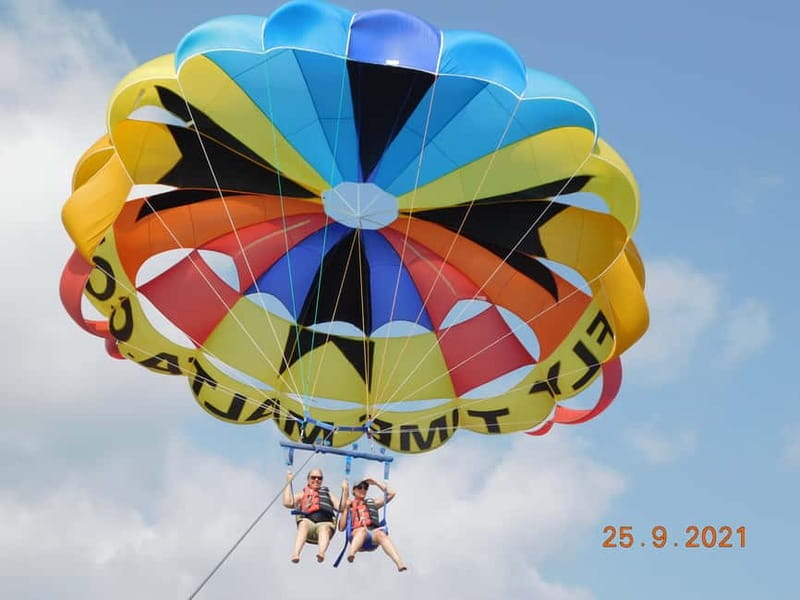 St. Julians: Parasailing Go & Fun with Free Photos & Videos - Language, access, and booking flexibility