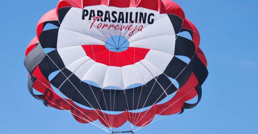 Torrevieja: parasailing experience - Getting fitted for the parachute