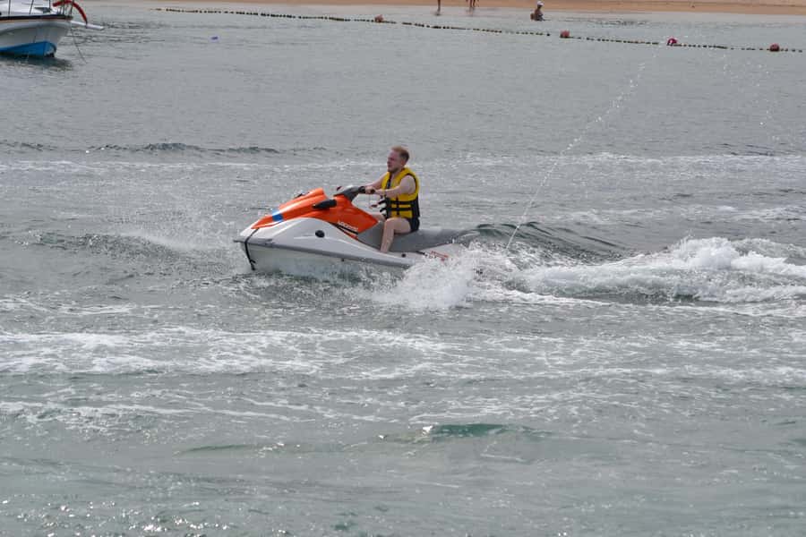 Triple Package Self Drive Jet Ski, Banana & Parasailing - Parasailing above the Nusa Dua coast